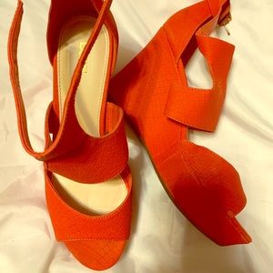 Women’s bright orange wedge sandals